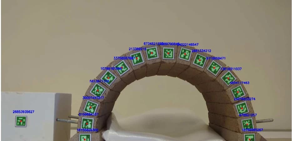 Scaled masonry arch instrumented with DeepTag markers.